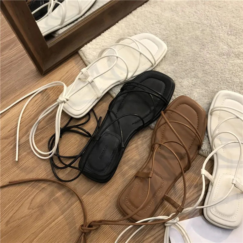 2026 New Women's Summer Fashion Flat Open-Toe Cross Lace-up Sandals Casual Elegant Dress Lace-up Beach Roman Style Sandals