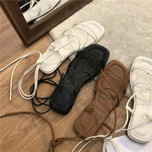 2026 New Women's Summer Fashion Flat Open-Toe Cross Lace-up Sandals Casual Elegant Dress Lace-up Beach Roman Style Sandals
